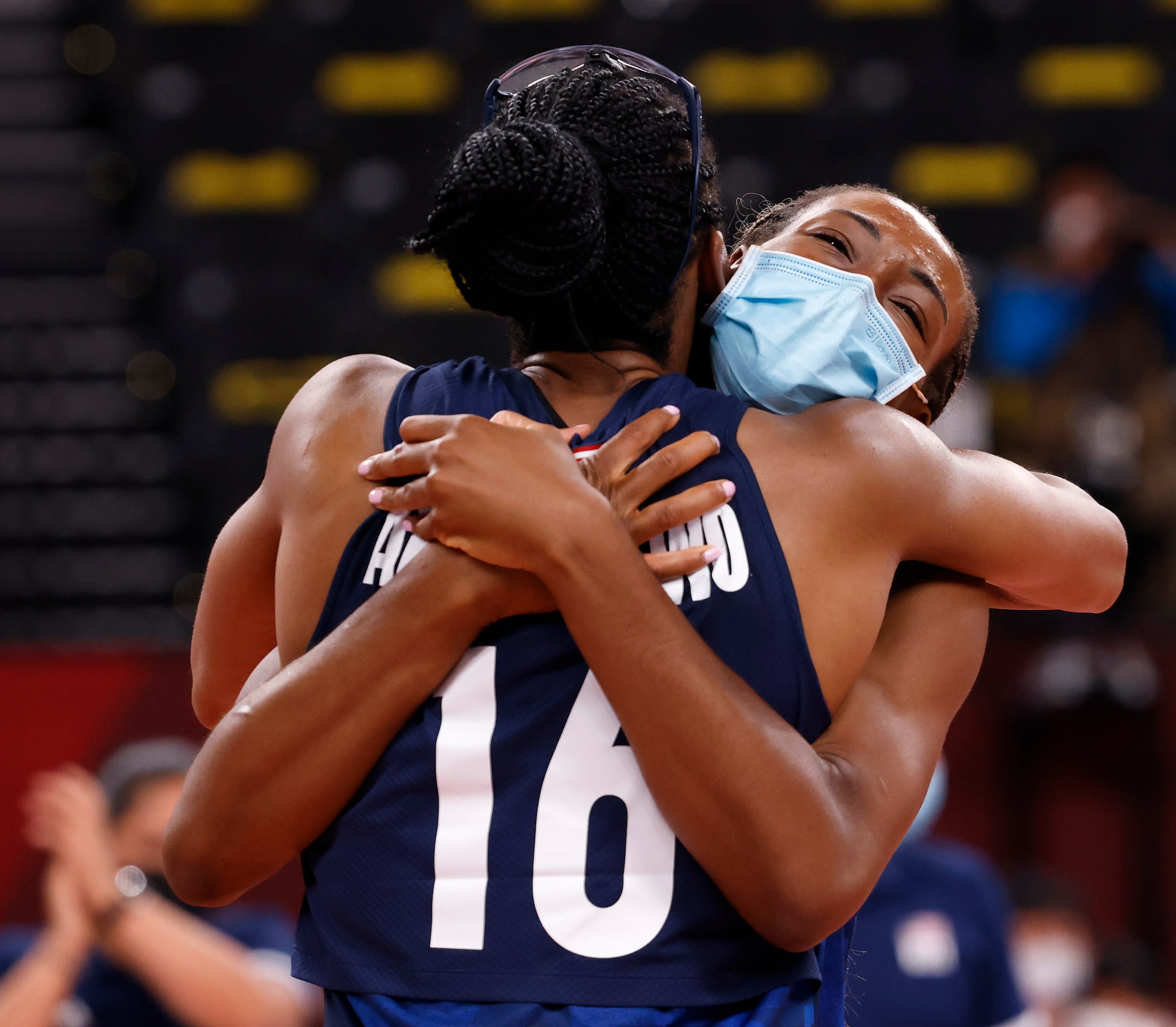 USA’s Chiaka Ogbogu (24) and Foluke Akinradewo (16) celebrate after defeating the Dominican...