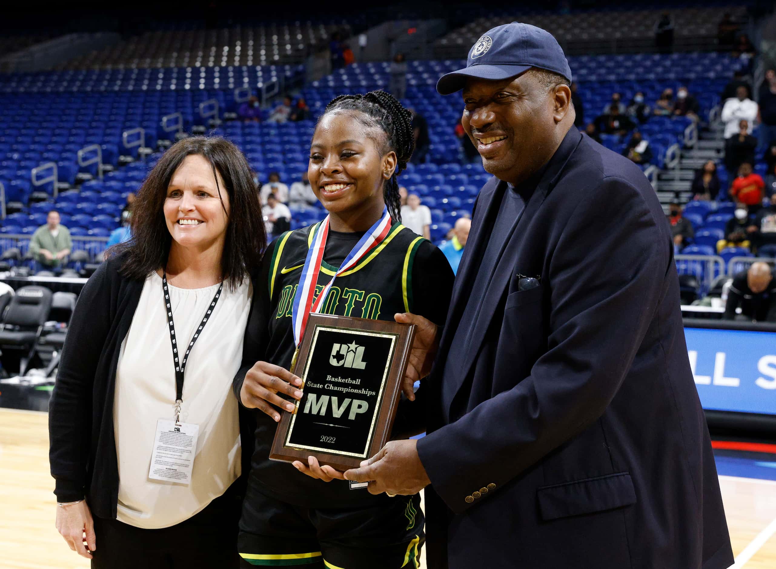 Texas State Sen. Royce West presents the MVP award to DeSoto guard Ja'Mia Harris (4) after...