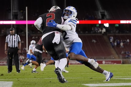 Stanford quarterback Elijah Brown (2) is sacked for a safety by SMU safety Cale Sanders Jr....