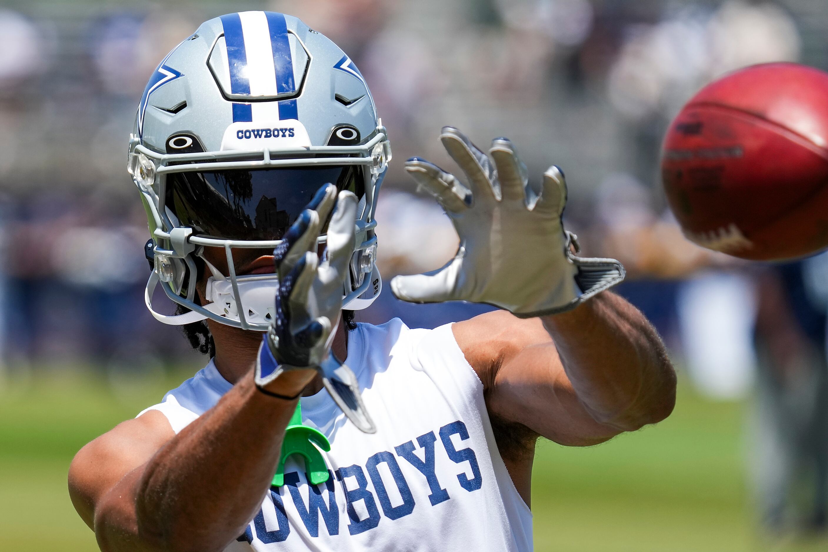 Dallas Cowboys wide receiver Jalen Tolbert catches a ball during a training camp practice on...