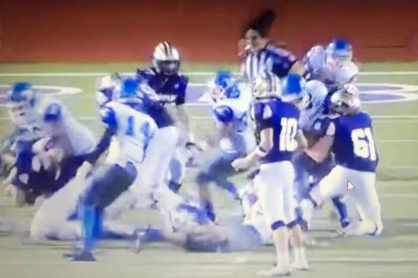 
Game official Robert Watts was rammed by two San Antonio Jay High School players in an...