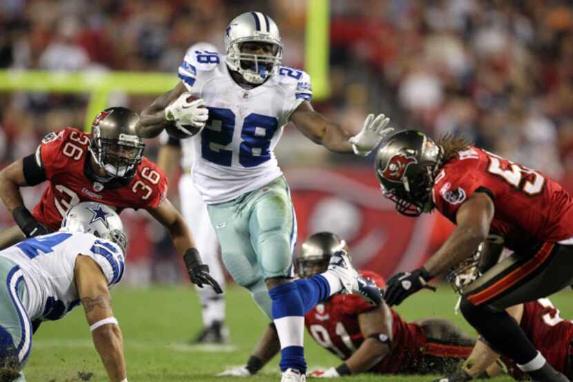 Dallas Cowboys running back Felix Jones (28) runs the ball during the Dallas Cowboys vs. the...