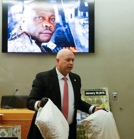 Prosecutor Glen Fitzmartin showed the pillows that were used to suffocate victims Mary...