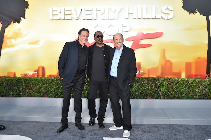 Judge Reinhold, Eddie Murphy and John Ashton arrive at the premiere of "Beverly Hills Cop:...