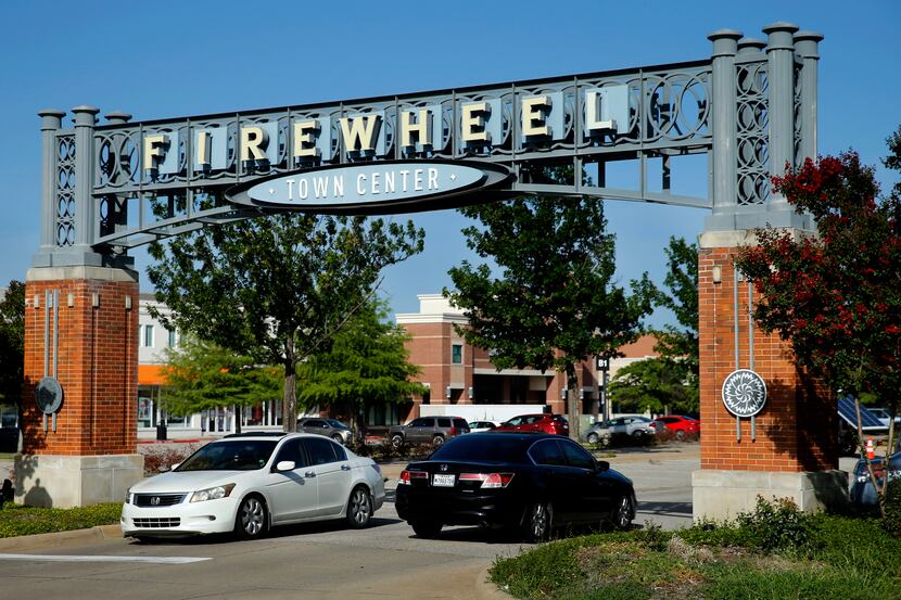 One of the entrances to Firewheel Town Center shopping center is pictured in Garland, Texas,...