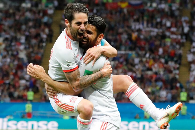 Spain's Diego Costa, right, celebrate after scoring his side's opening goal with Spain's...