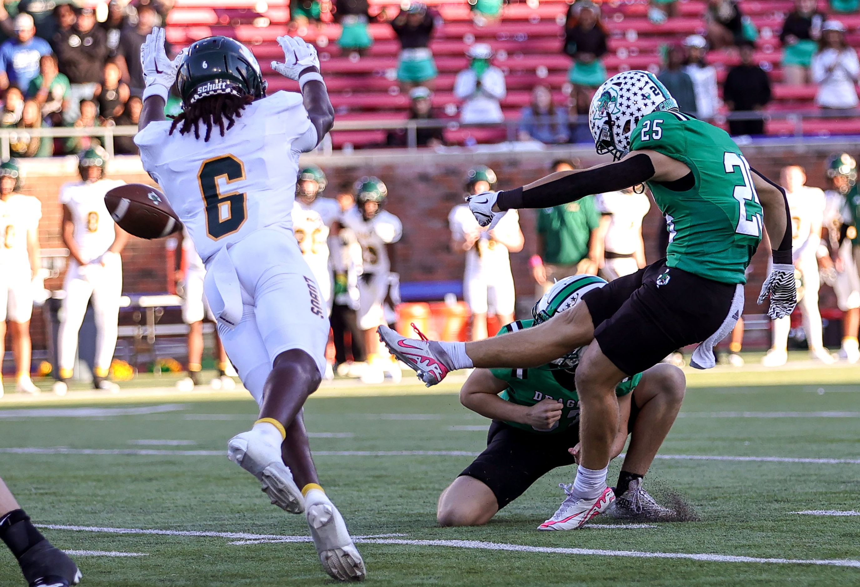 Southlake Carroll kicker Gavin Strange (25) kicks the game winning field goal to beat...