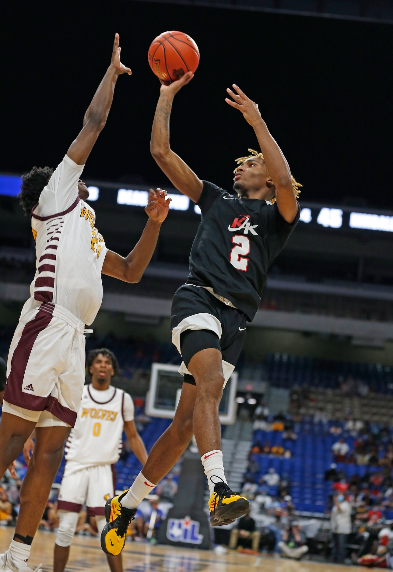 Dallas Kimball Arterio Morris #2 shoots over a defender. UIL boys Class 5A basketball state...