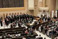 Artistic director James Richman (at the harpsichord) led the Dallas Bach Society Chorus and...