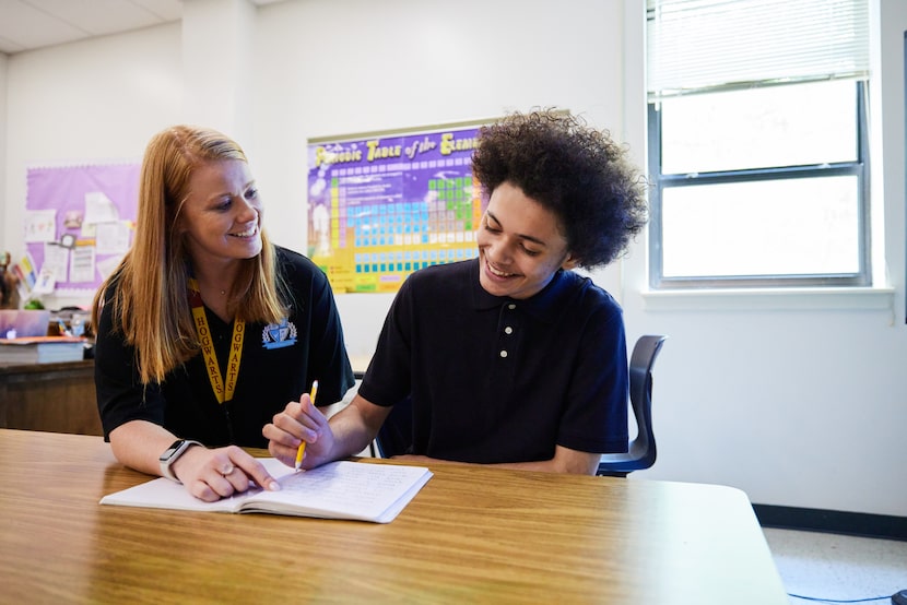 Jesus Moroles reading teacher Madeline Whitacre and student Gabriel Carvajo sit at a large...