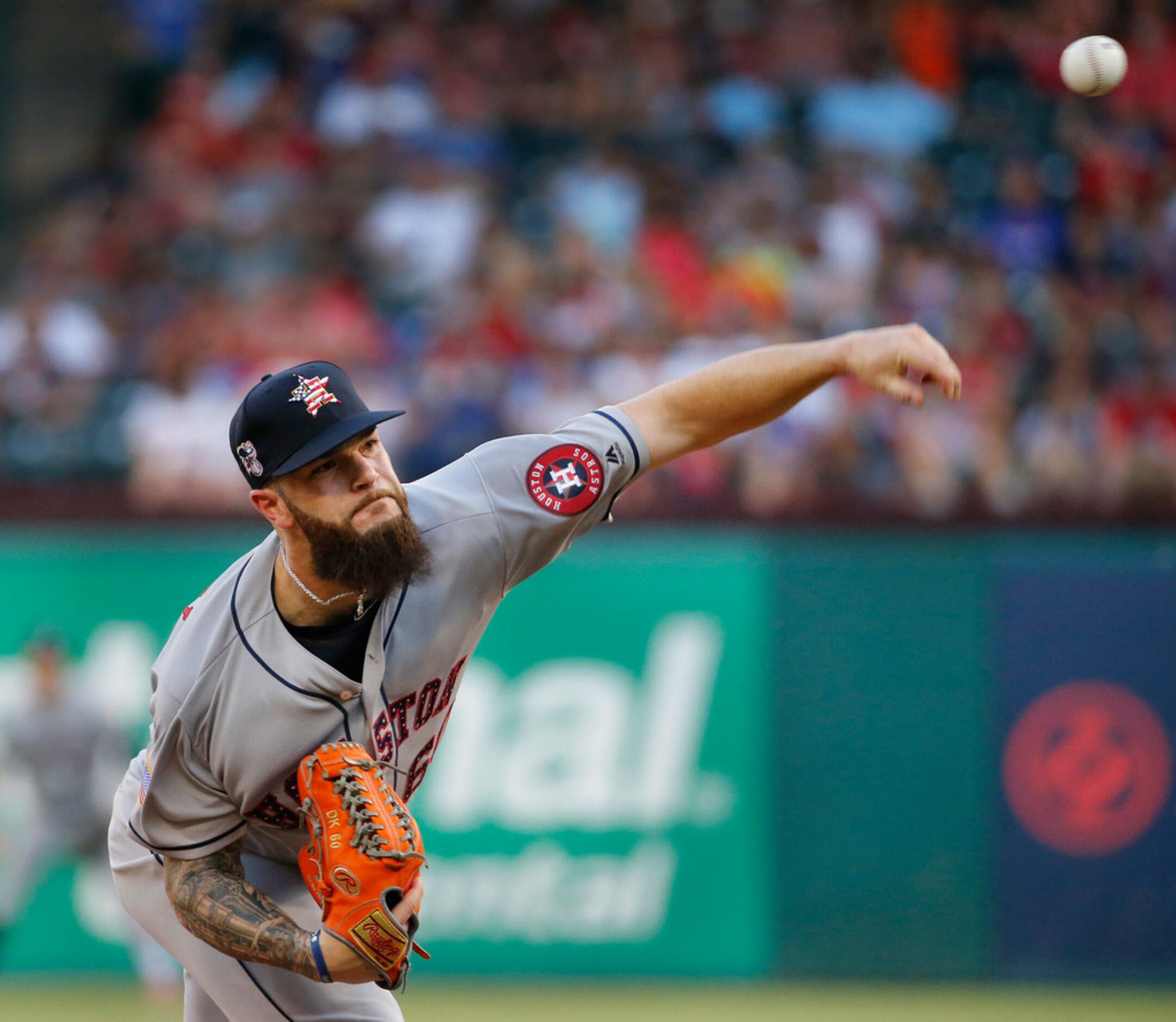 Houston Astros starting pitcher Dallas Keuchel (60) throws a pitch in the first inning...