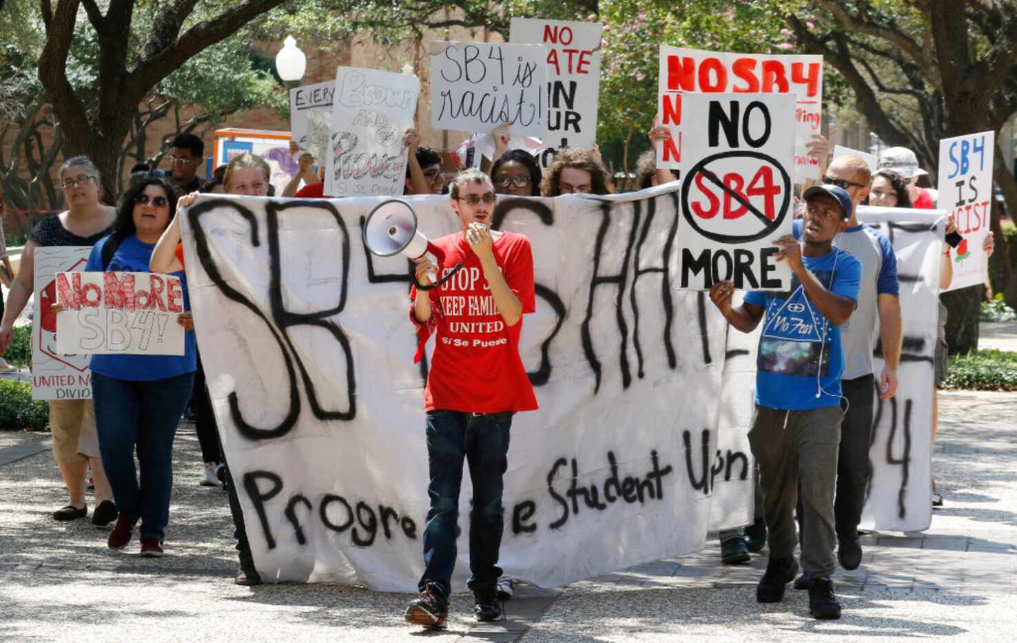Student marchers at UTA on Friday protested the Texas sanctuary cities ban. 