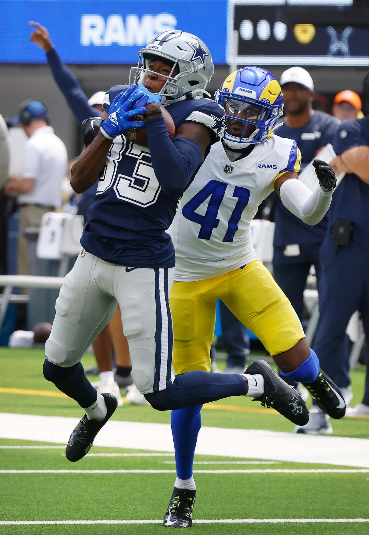 Dallas Cowboys wide receiver Jalen Brooks (83) huals in a long pass reception against Los...