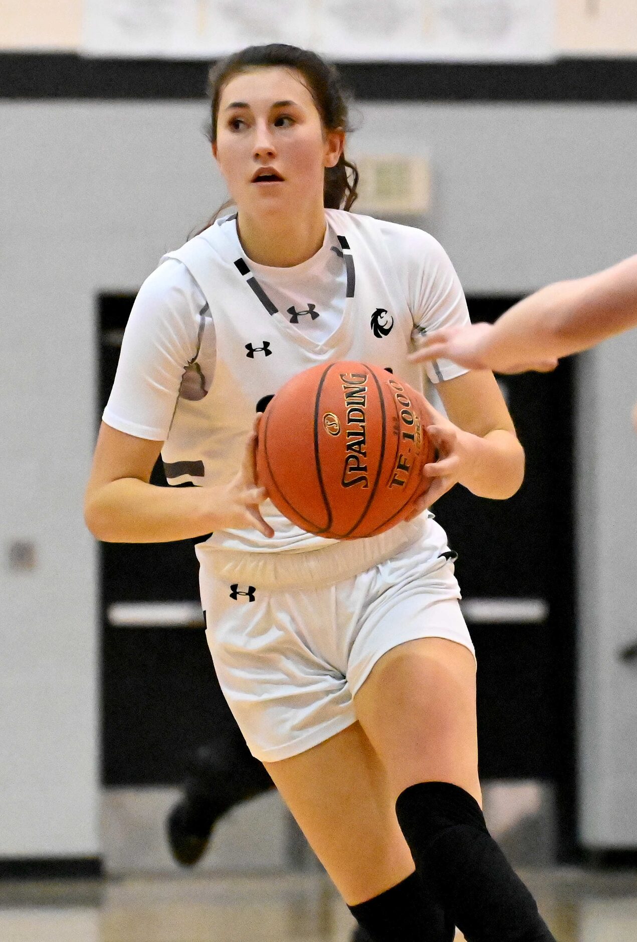 Denton Guyer’s Bella Earle in the first half of a girls high school basketball game between...