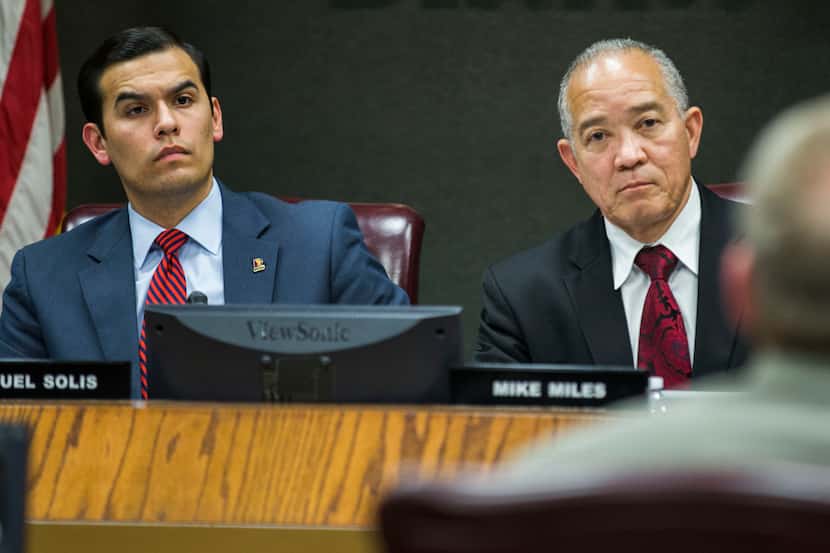  Trustee Miguel Solis, Â left, and Superintendent Mike Miles at a board meeting in...