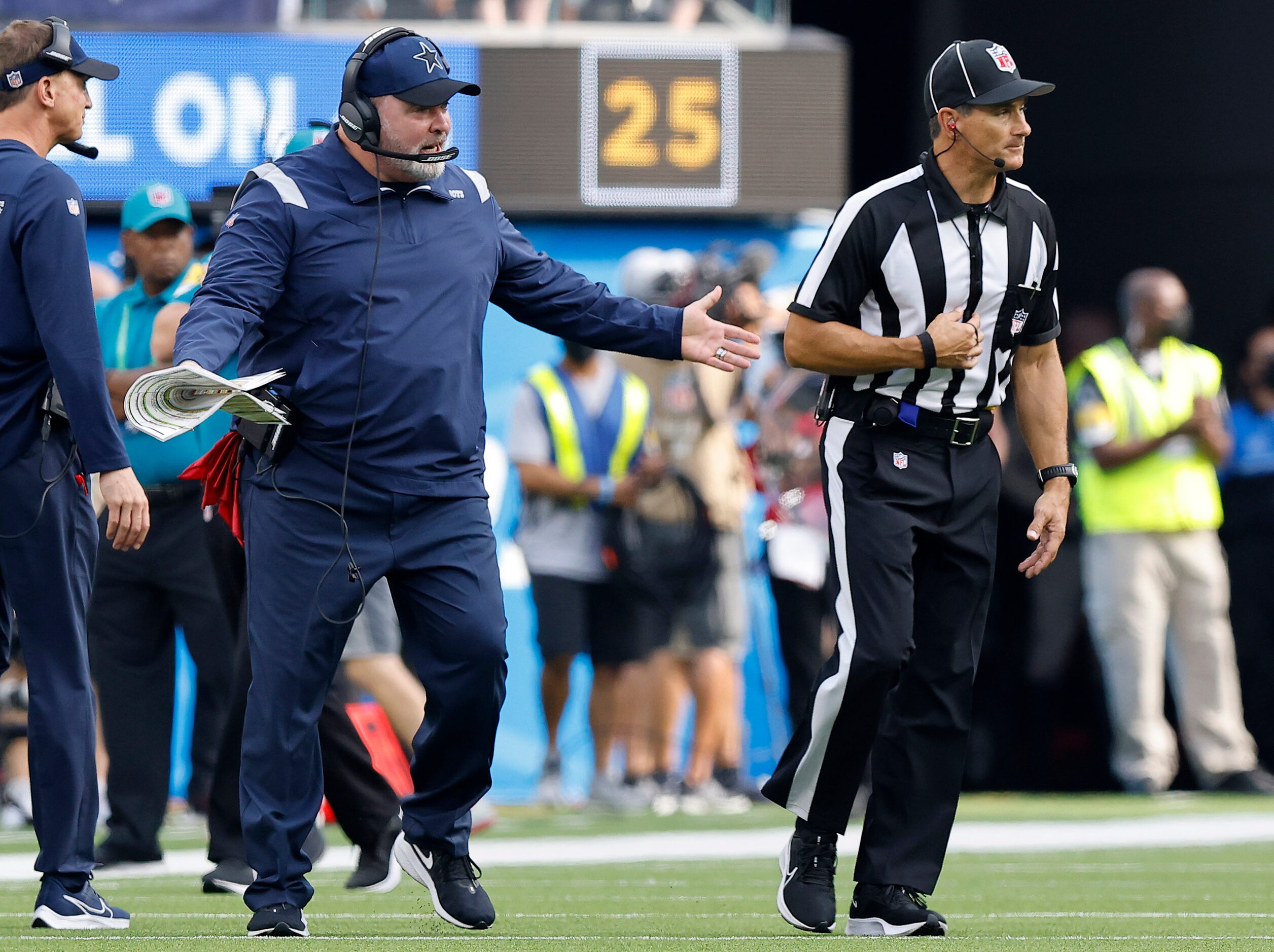 Dallas Cowboys head coach Mike McCarthy argues a call with an official during the fourth...