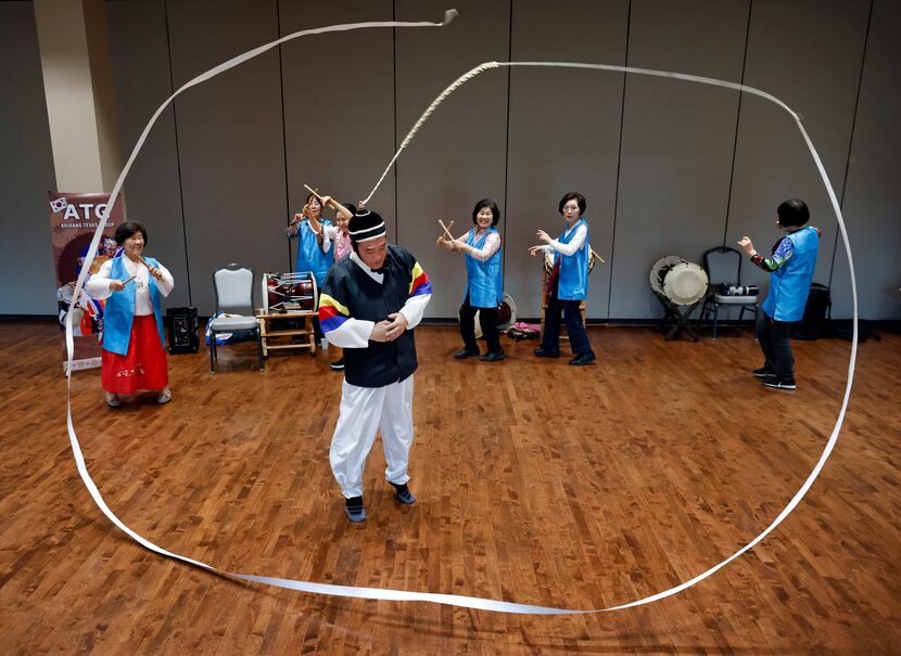 Arirang Texas Group member Scott Kim of Carrollton, Texas dances to BTS' "Arirang" in his...