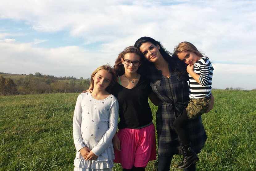 Angie Harmon with her daughters (from left: Avery, Finley and Emory).