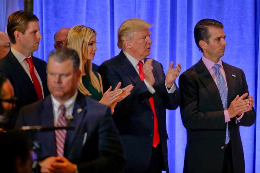 President-elect Donald Trump waits with family members Eric Trump, left, Ivanka Trump and...