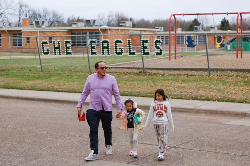 Jacob Gallegos, (left), with his daughters, Isadora, 5, (center) and Greenwood Hills...