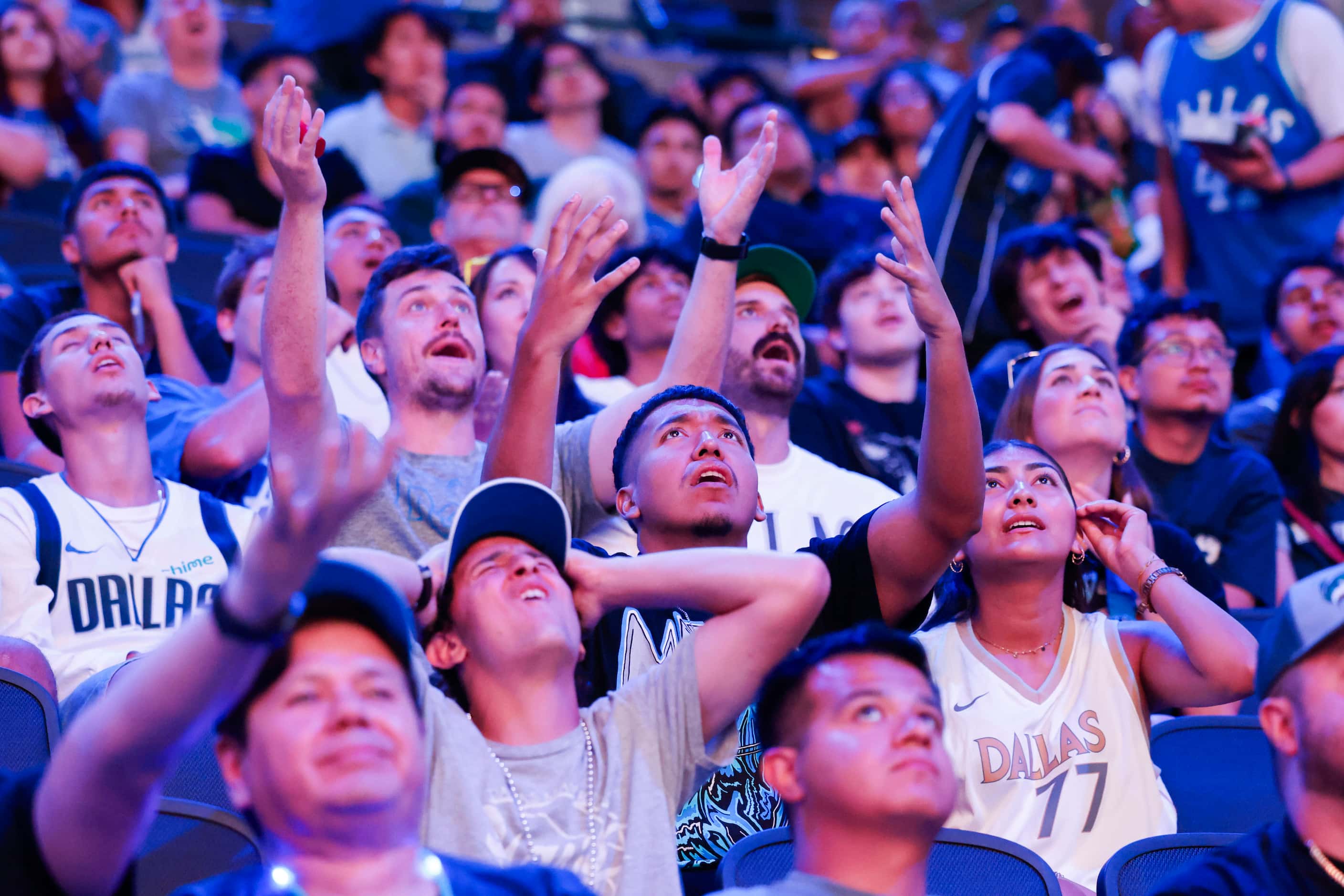 Dallas Mavericks fans react to a foul call in the second quarter of the NBA Finals Game 5...
