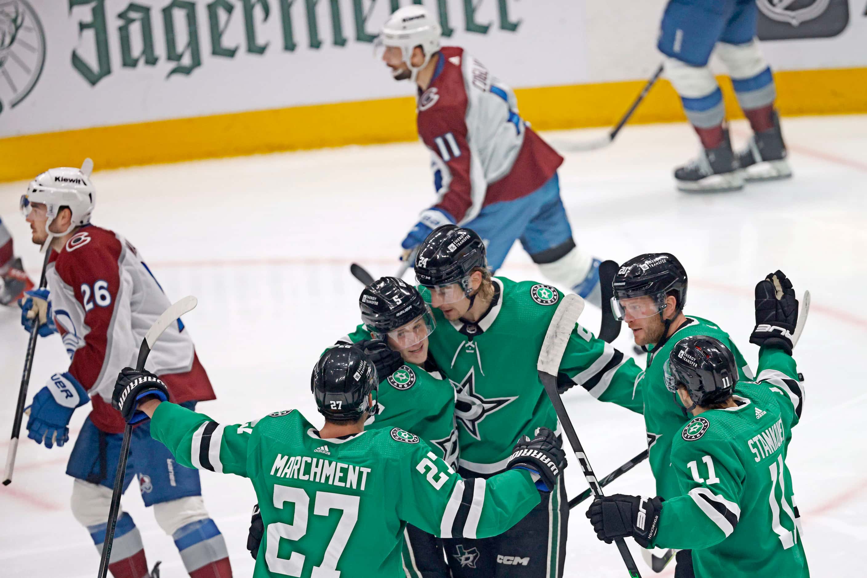 Dallas Stars center Roope Hintz (24), third from right, celebrates with his teammates after...
