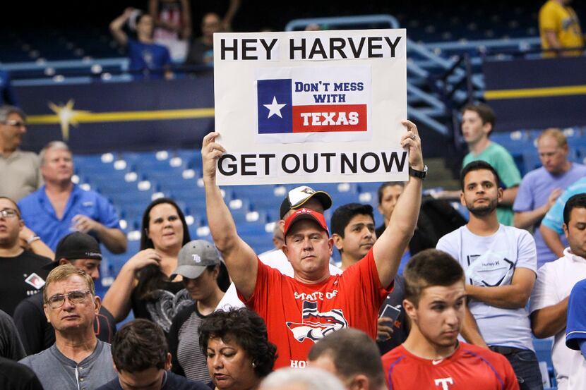 Fans show support for the people of Houston dealing with the effects of Hurricane Harvey...