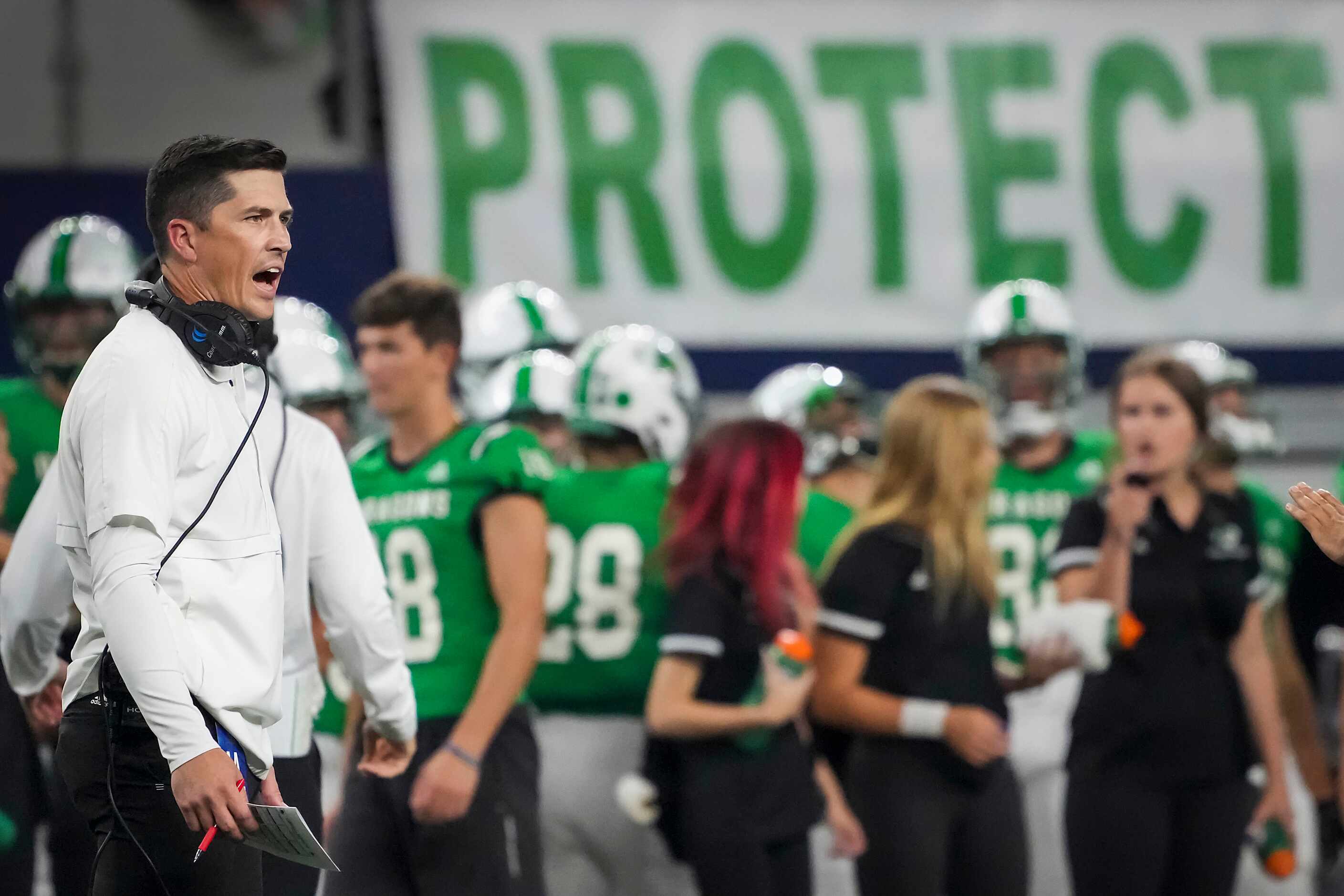 Southlake Carroll head coach Riley Dodge works on the sidelines during the first half of a...