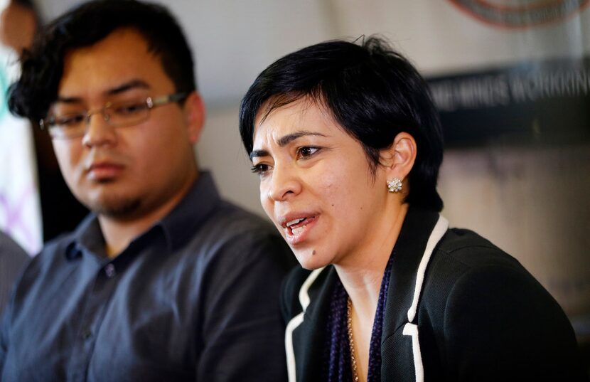 Romero's attorney Michelle Pareja answers questions during a news conference. She works for...