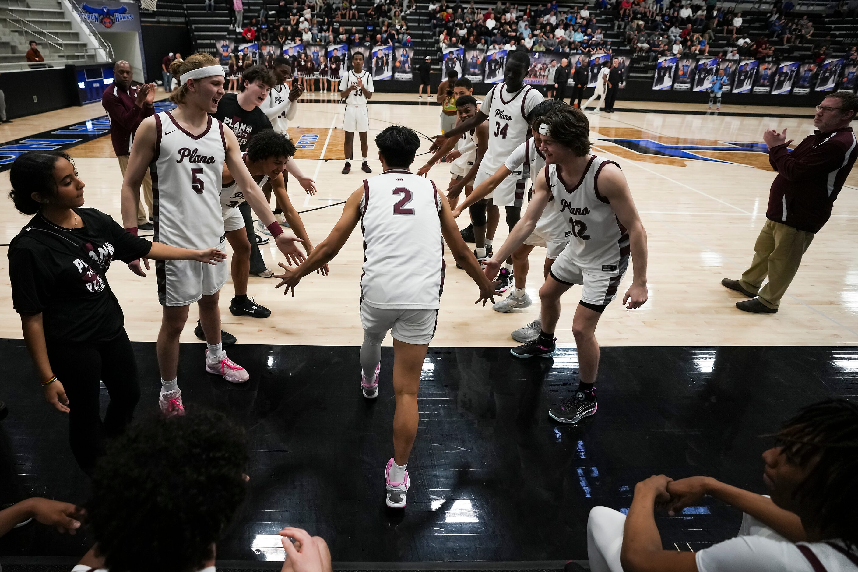 Plano guard Justin Buenaventura (2) takes the floor before the first half of a boys Class 6A...