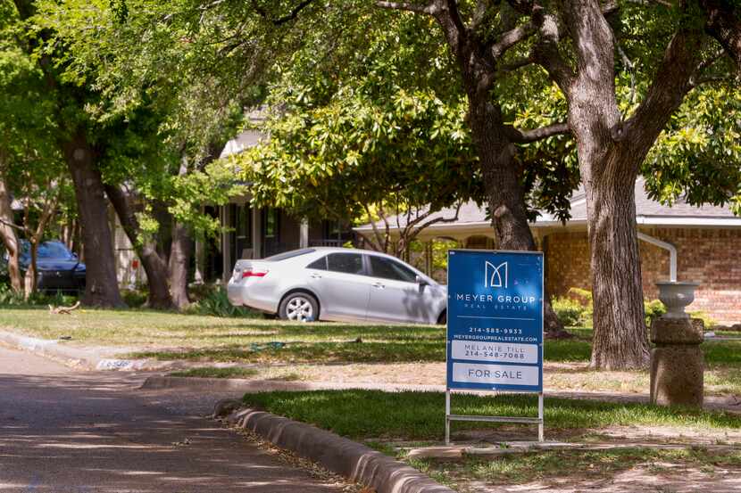 A for sale sign sits in the yard of a home in Northeast Dallas on Monday, April 17, 2023.