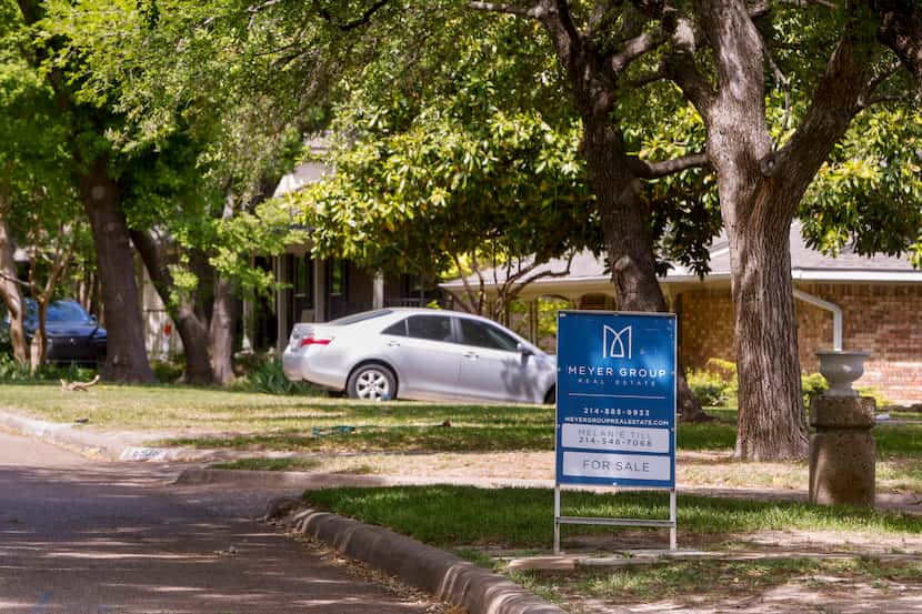 A for sale sign sits in the yard of a home in Northeast Dallas on Monday, April 17, 2023....