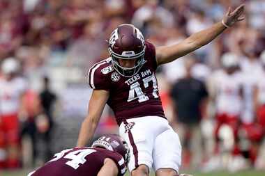 Texas A&M place kicker Seth Small (47) kicks a field goal against Lamar during the first...