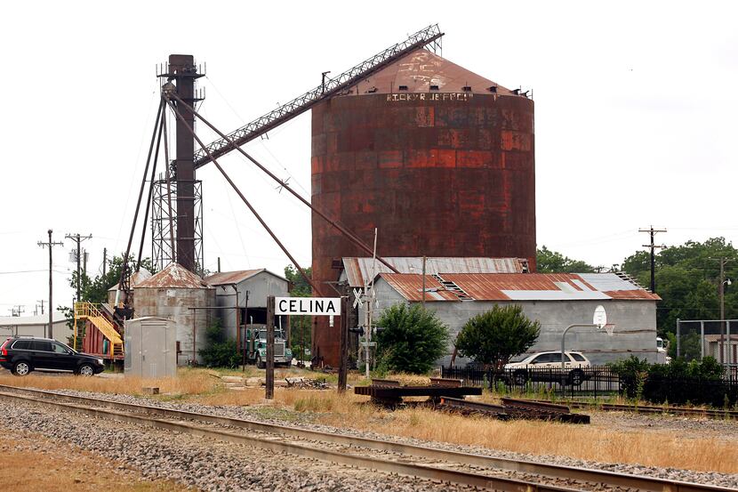 The grain silo that operates on a railroad track near Walnut and Louisana Streets in...