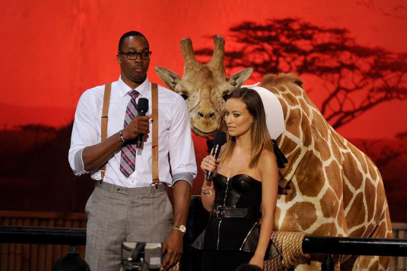 Dwight Howard, left, and Olivia Wilde present the stand up of the year award at Spike TV's...