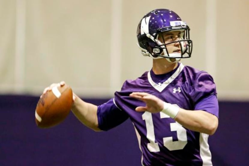 
Northwestern quarterback Trevor Siemian throws as the football team participates in an NCAA...