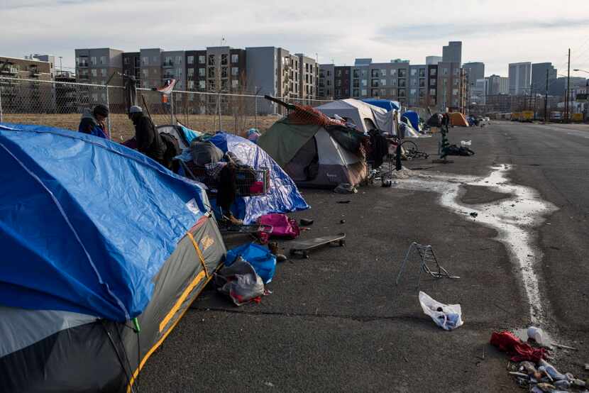 A homeless encampment near a new apartment complex in Denver, Jan. 2, 2017. Activists and...