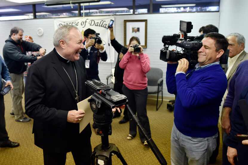 Bishop Edward Burns speaks with members of the media after being introduced as the new...
