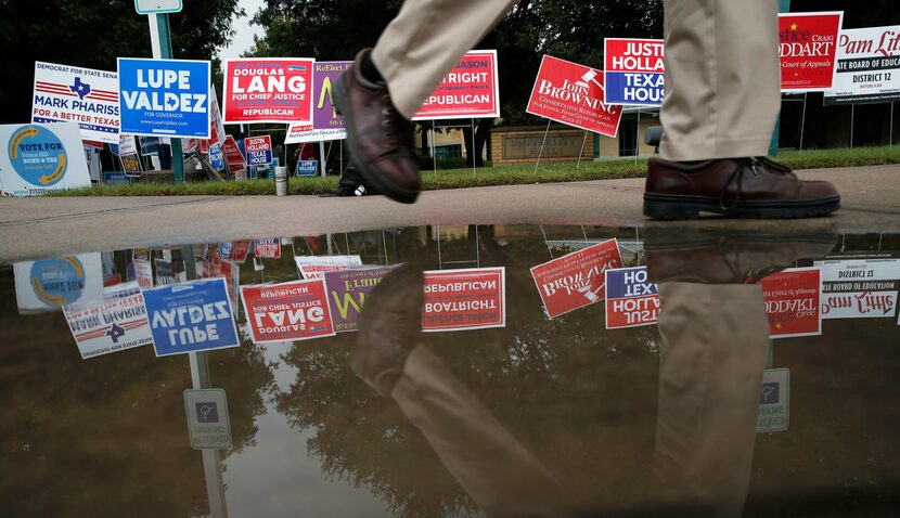 A voter made his way back to his car after voting at Collin College in Frisco on Thursday....