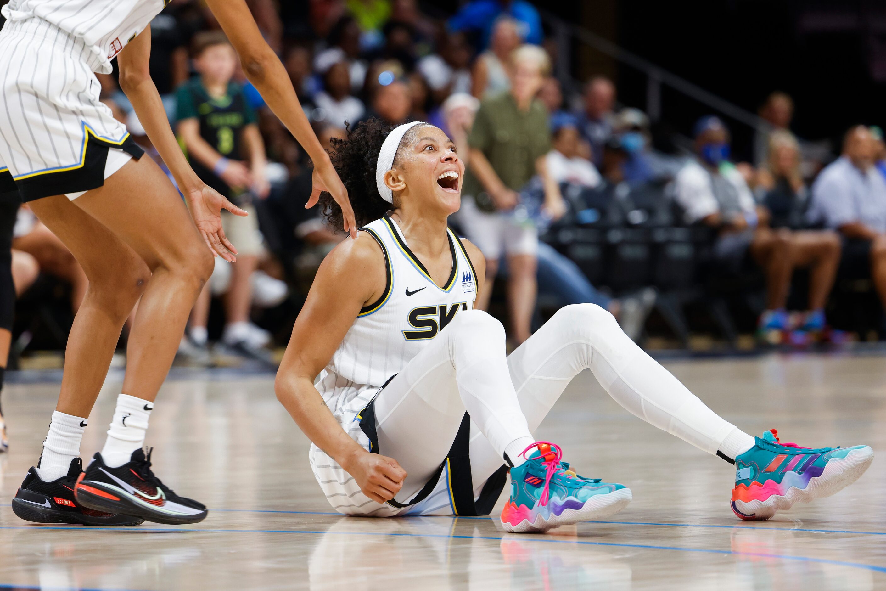 Chicago Sky forward Candace Parker reacts after being fouled by Dallas Wings during the...