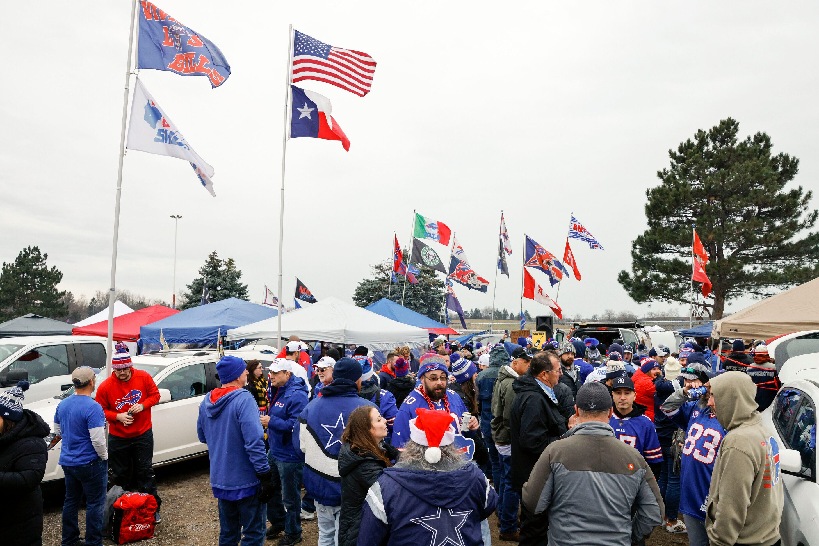 Dallas Cowboys and Buffalo Bills fans tailgate before an NFL game, Sunday, Dec. 17, 2023, in...