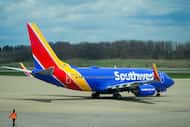 A Southwest Airlines flight pushes back from the gates at Pittsburgh International Airport...
