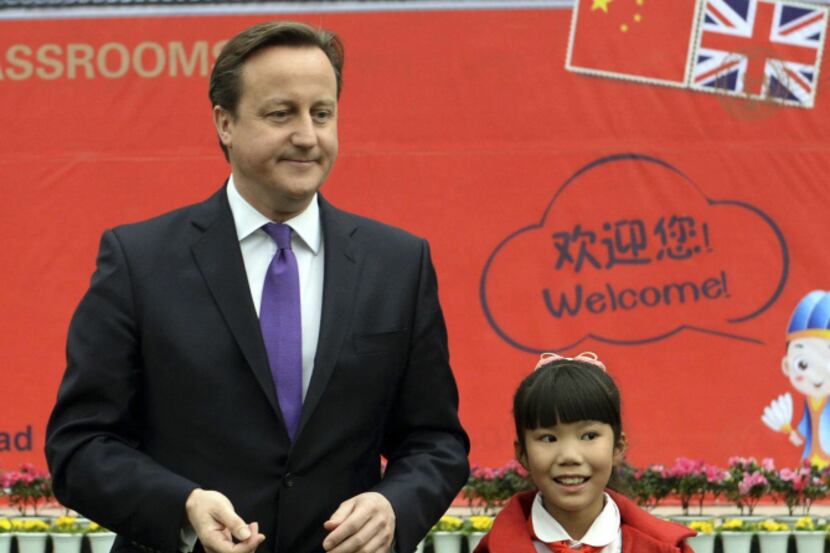 British Prime Minister David Cameron visits a primary school in southwest China.
