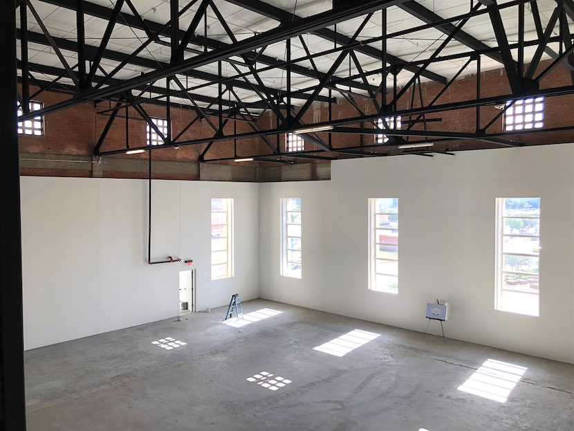 The interior of the old Masonic building has large open space.