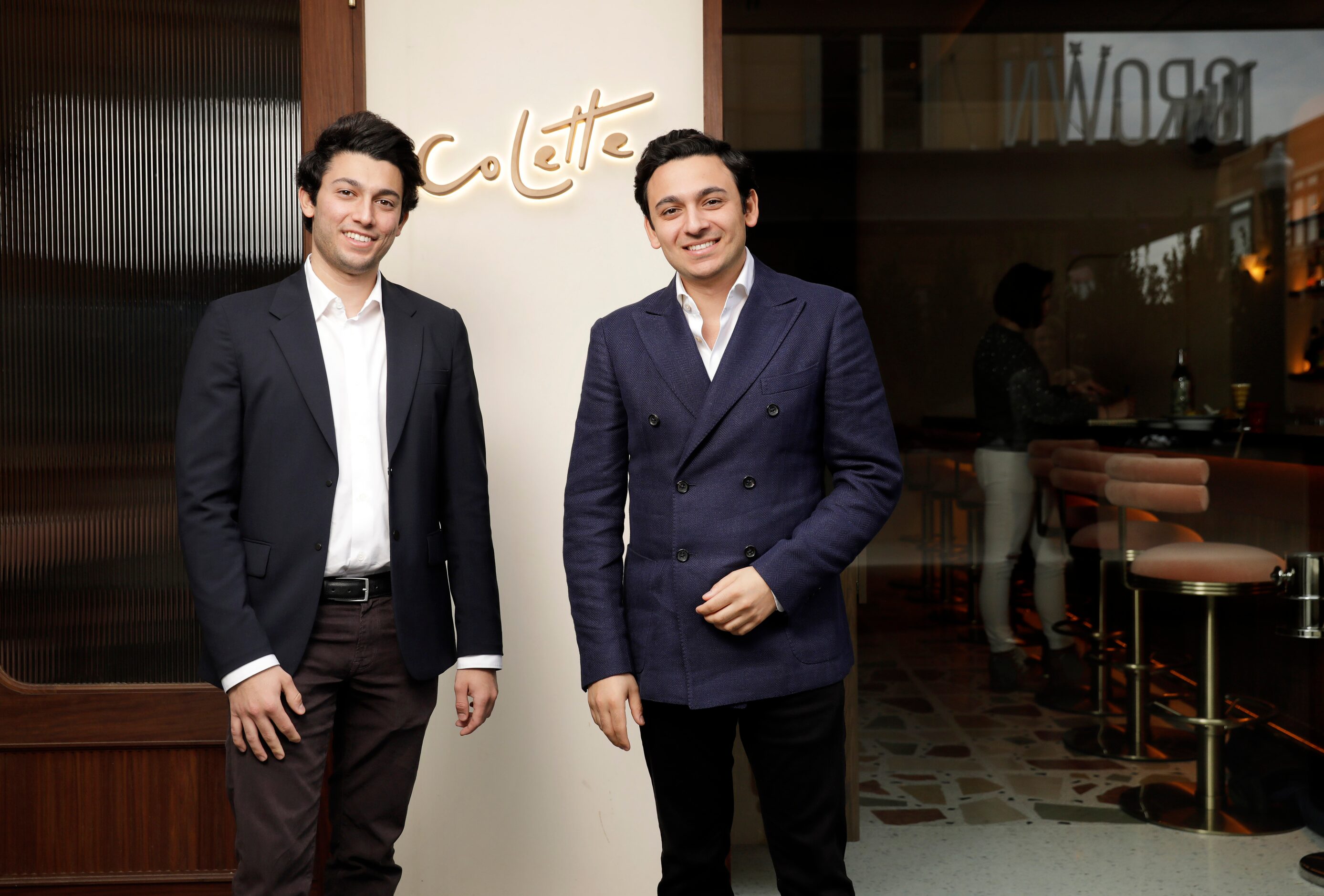 SMU graduate brothers Henry (left) and Brandon Cohanim of Los Angeles are pictured outside...