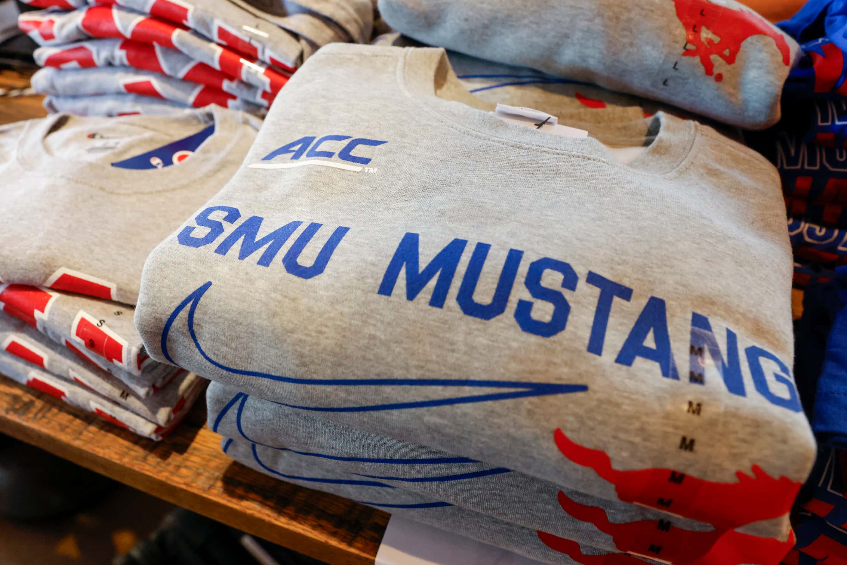 An SMU sweatshirt featuring an ACC logo during a celebration of SMU’s first day in the ACC...