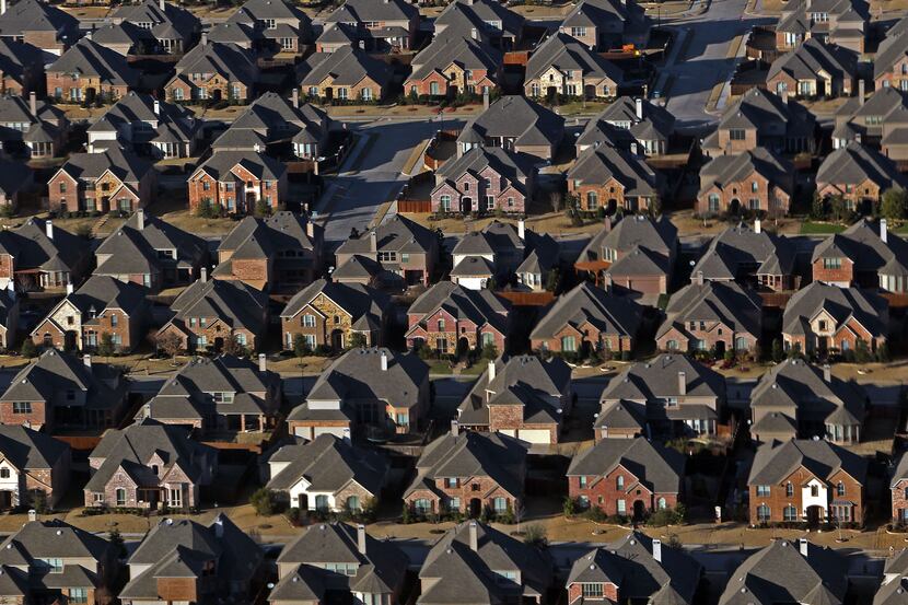 An aerial view of new housing spreading out to the north in Frisco. Dallas-Fort Worth home...