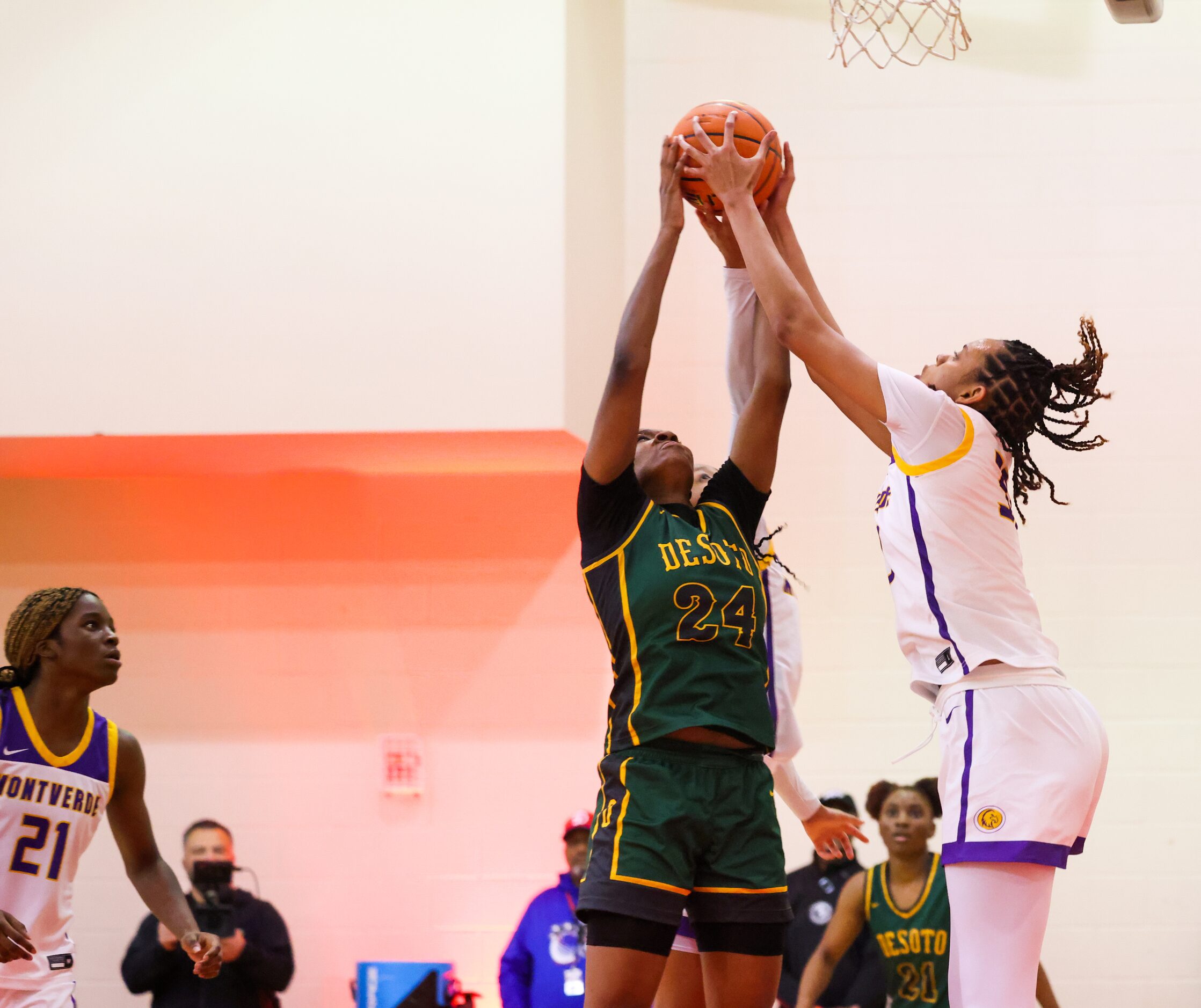 A shot by DeSoto small forward Amari Byles (24) is blocked by Montverde Academy Lety...