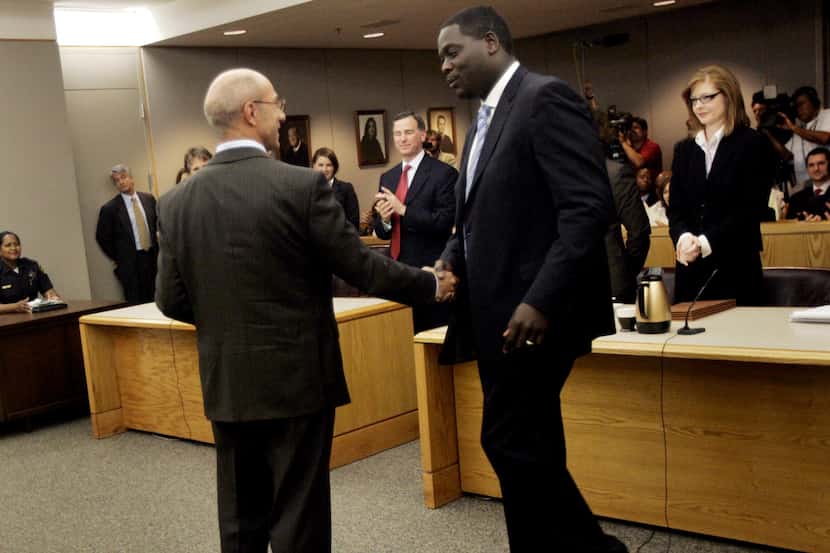  Then-Dallas District Attorney Craig Watkins congratulated former inmate Steven Charles...