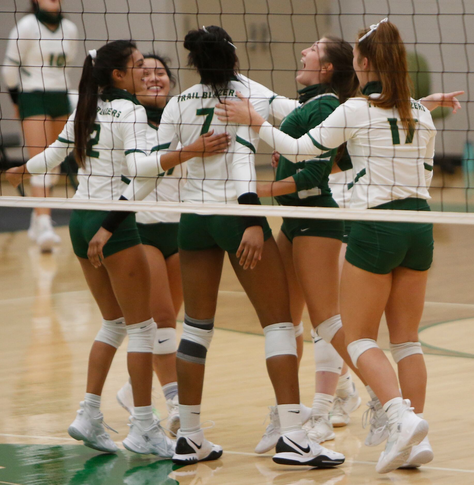 A monster spike from Frisco Lebanon Trail's Tyrah Ariail (7), electrifies teammates during...